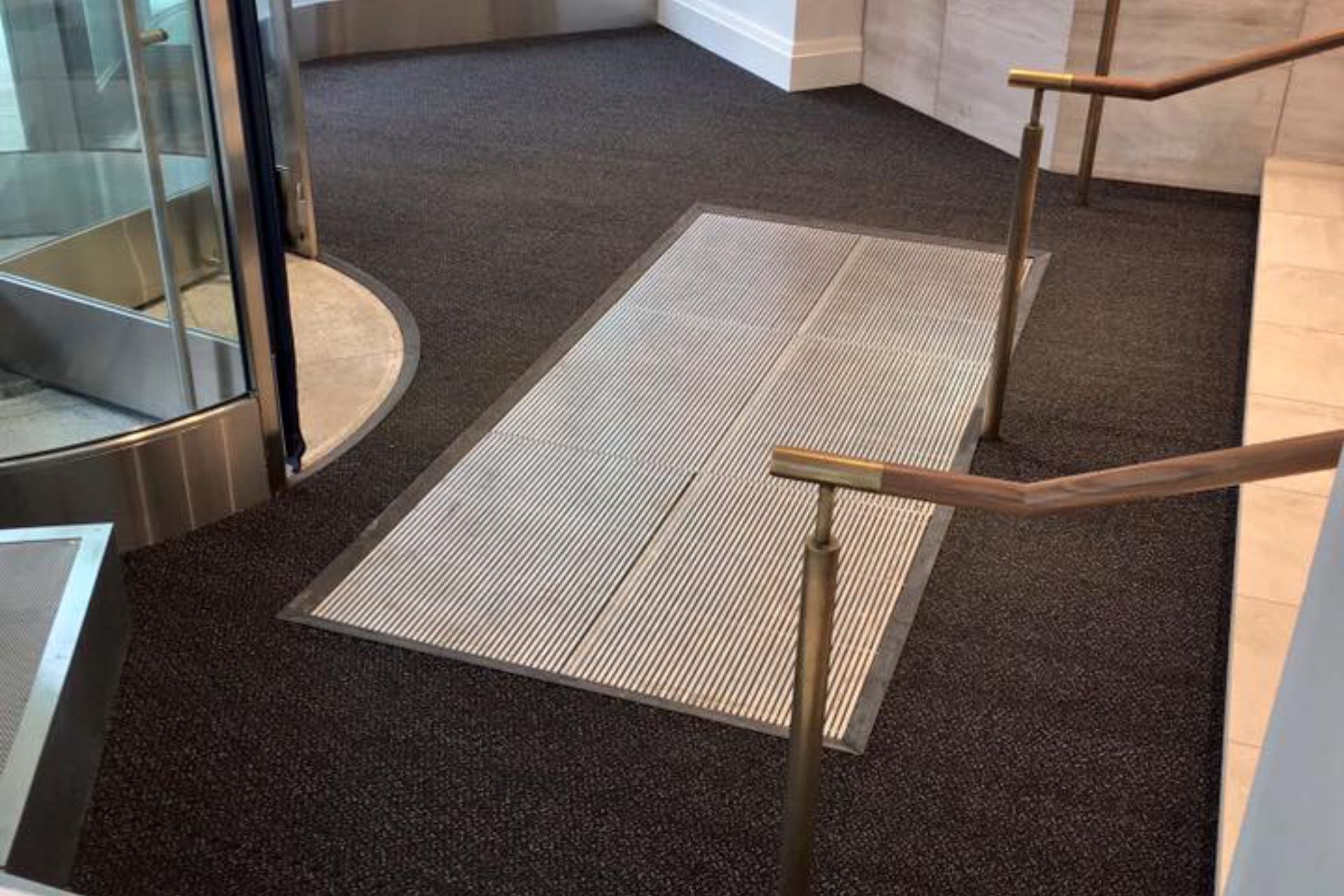 The Entrance Mat Dilemma: Why Buying Triumphs Over Renting for Your Facility